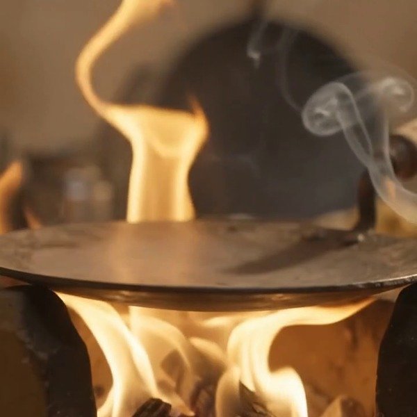Crackling babool woodfire embers in the artisanal chulha